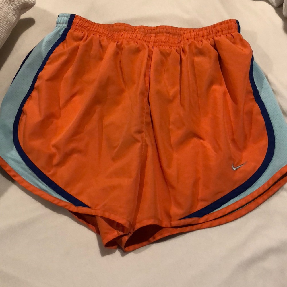 Orange Nike shorts